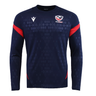 The USA Rugby 25/26 LS Training Poly Shirt by Macron features a navy design with diamond pattern, red sleeve accents, and the USA Rugby logo—an ideal long sleeve training shirt for both practice and casual wear.