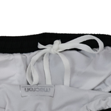 Close-up of the waistband on Women's USA Rugby 25/26 Athletics Shorts by Macron, featuring a white drawstring bow and visible Macron label—ideal for quick-dry training or as official USA Rugby gear.