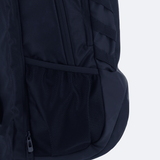 Close-up of the USA Rugby 25/26 Athleisure Backpack by Macron, highlighting its mesh side pocket, zippered compartment, and padded strap against a plain background.