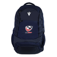 The USA Rugby 25/26 Athleisure Backpack by Macron is a navy blue bag with the USA Rugby logo and a white geometric front emblem, offering multiple zippered compartments and mesh side pockets for organized storage.