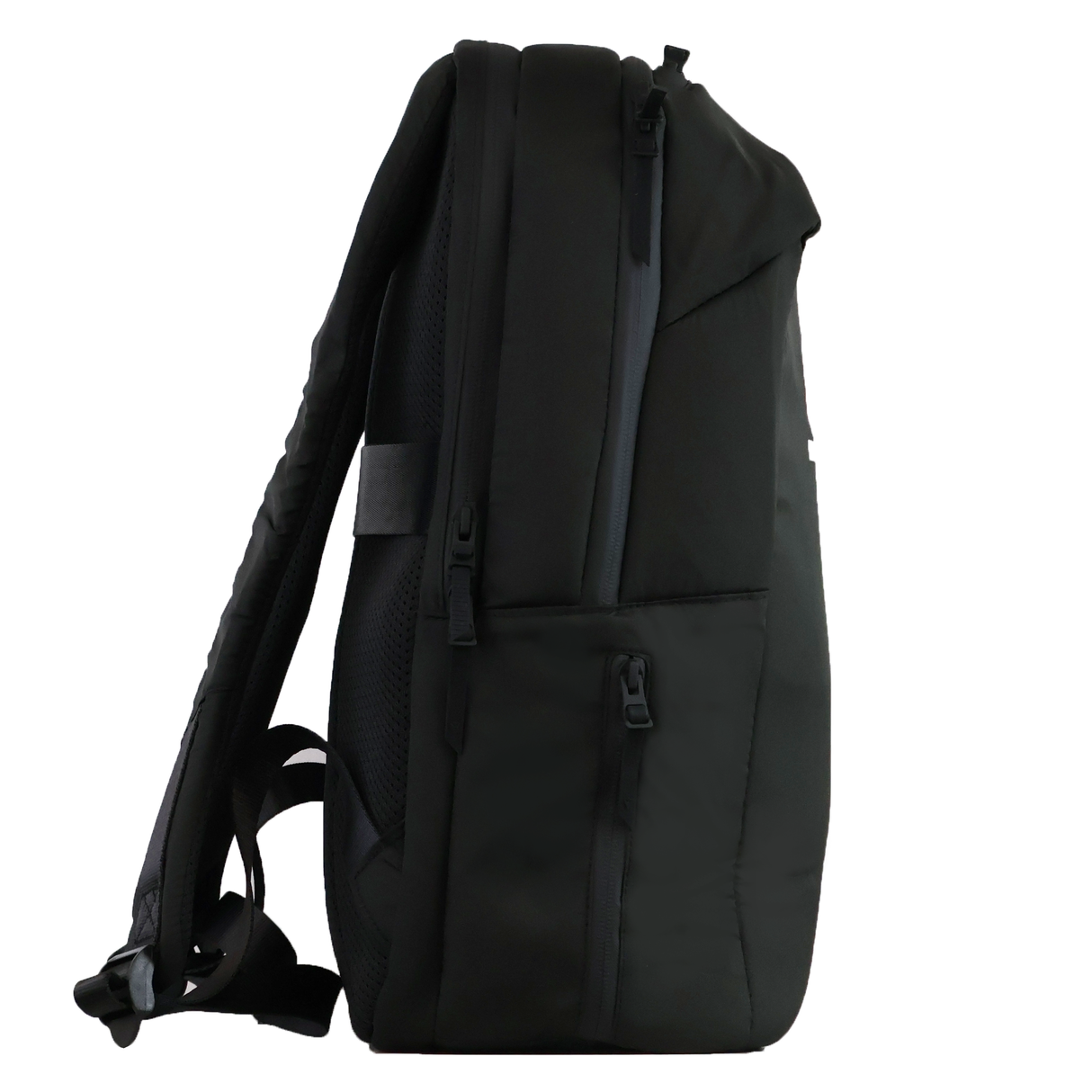 The USA Rugby 25/26 Staff Backpack by Macron is shown from the side in black, featuring multiple zippered compartments and padded shoulder straps.
