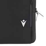 Close-up of the black USA Rugby 25/26 Staff Backpack by Macron, featuring a white geometric logo and a right-side zipper with a black pull cord.