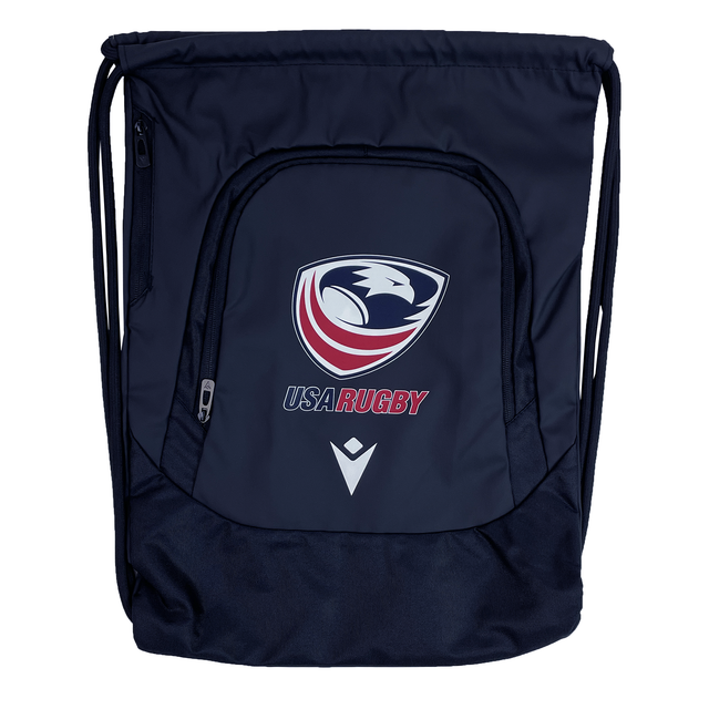 The USA Rugby 25/26 Athleisure Gym Sack by Macron is a navy blue drawstring bag with the USA Rugby eagle logo and "USARUGBY" text—ideal as a waterproof gym sack for rugby fans with an active lifestyle.
