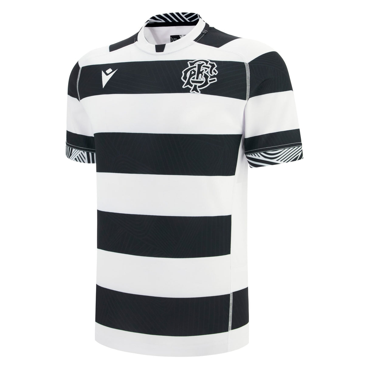 The Barbarians 25/26 Replica Home Jersey by Macron is a short-sleeved, black and white striped rugby jersey with a crew neck and Macron logos on the chest and sleeves.
