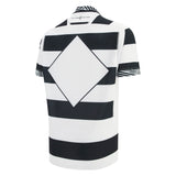 The Barbarians 25/26 Replica Home Jersey by Macron features bold black and white horizontal stripes, a large diamond shape on the back, and classic short sleeves—paying homage to traditional Barbarians style.