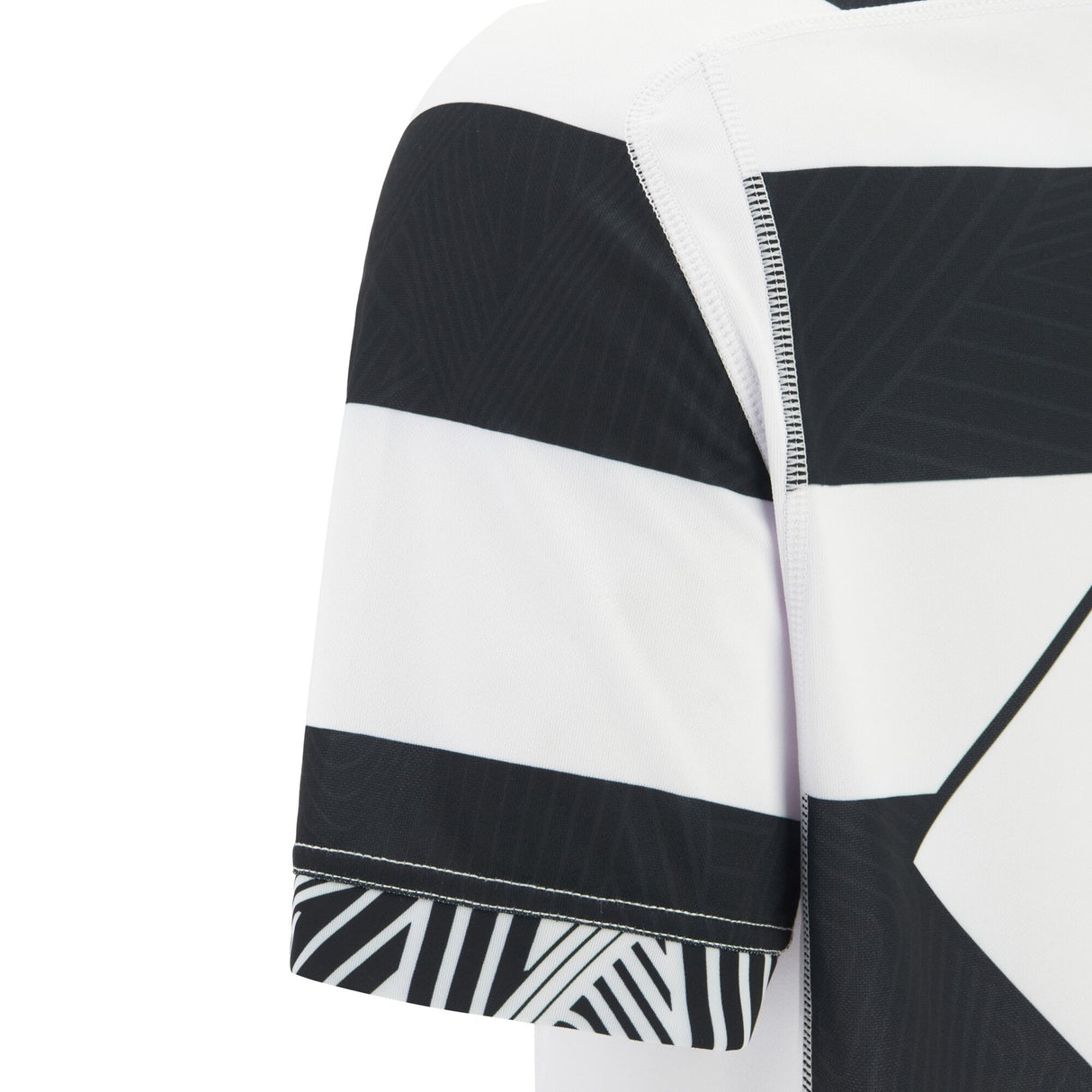 Close-up of the Barbarians 25/26 Replica Home Jersey by Macron, a short-sleeve rugby jersey with bold black and white horizontal stripes and a subtle leaf pattern, inspired by classic Barbarians style.