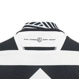 Close-up of the back collar on the Barbarians 25/26 Replica Home Jersey by Macron, showing “FLAIR • COURAGE • SPIRIT • PASSION” text and a small logo beneath the neckline.