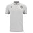 The Barbarians 25/26 Player Travel Polo by Macron is a light grey short-sleeve polo with a three-button placket, black embroidered chest logos, and a classic collar.