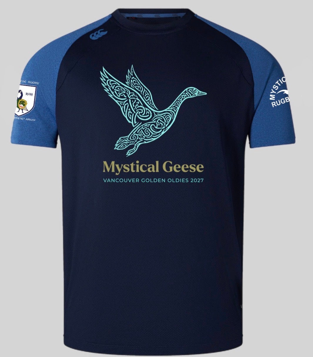 Introducing the Mystical Geese Elite Training Tee by Canterbury from WRS Canterbury: This navy blue rugby shirt features striking blue sleeves and is expertly crafted from Vapodri fabric, ensuring exceptional comfort and performance. Showcasing a bold stylized goose graphic alongside the “Mystical Geese Vancouver Golden Oldies 2027” text on the front, this lightweight yet durable tee also includes logo accents on both sleeves—making it an ideal choice for fans and players seeking elite training wear.