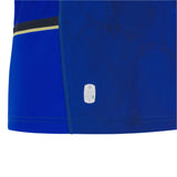 Close-up of the lower section of the Italy 25/26 Replica Home Jersey by Macron, showing a small "ECO4" label with symbols and a black and yellow accent stripe near the side seam.