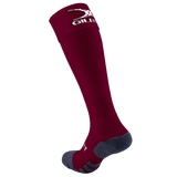 Try the Gilbert Pro Match Sock by Gilbert: maroon knee-high with dark gray heel and toe for enhanced comfort. A white logo near the top offers style and functionality, making them perfect performance socks.
