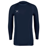 The Gilbert Atomic II Baselayer is a navy blue long-sleeve rash guard with visible stitching and a small white Gilbert logo on the left chest, designed for moisture wicking to keep you dry during intense activity.