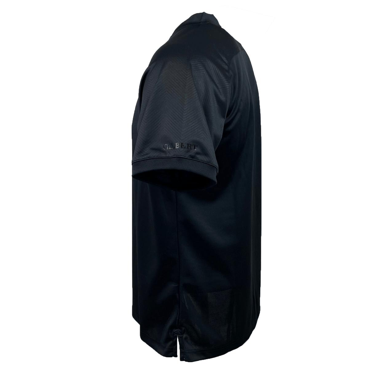 Side view of the Gilbert Evo Performance Training Tee, a black short sleeve athletic rugby training shirt featuring a subtle V-shaped pattern and the brand name "Gilbert" on the lower edge of the sleeve.