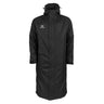 The Gilbert TTS Touchline Jacket by Gilbert is a long black hooded coat featuring a front snap closure and a white Gilbert logo on the left chest, styled in the classic design of a waterproof coaches jacket and shown against a plain white background.
