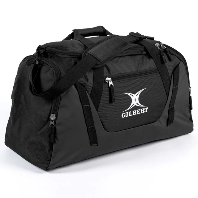 The Gilbert Club Player Holdall Duffle Bag by Gilbert features a shoulder strap, zippered compartments, and the classic Gilbert logo on the front pocket—ideal for transporting your rugby gear.