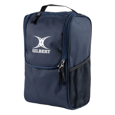 The Gilbert Club Boot Bag by Gilbert is a navy blue boot bag made from diamond ripstop fabric with a PU finish. It features a front zippered pocket, mesh side pocket, top handle, and the Gilbert logo on the front.