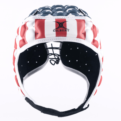 Gilbert USA Stars and Stripes XP 250 Headguard featuring a red, white, and blue design with stars, resembling the American flag, and the brand name "GILBERT" on the front.