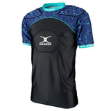 The Gilbert Atomic V3 Body Armour is a short-sleeve black and blue rugby shirt with padded shoulders and chest for lightweight protection, featuring the Gilbert logo prominently on the front center and collar.