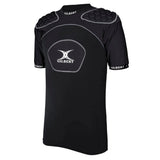 The Gilbert Atomic V3 Body Armour is a black short-sleeve padded sports shirt featuring "Gilbert" branding on the chest, shoulders, and sleeves. This lightweight rugby body armour incorporates visible hexagonal pads on the shoulders and chest for enhanced comfort while maintaining optimal mobility.