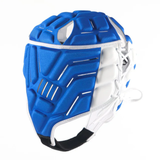The Vapour 5-25 Headguard by Gilbert is a blue and white sports face mask with adjustable laces, angular protective sections, and 5-layer foam for impact protection, shown against a plain white background.