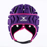 A Gilbert Octane Headguard in purple, featuring black EVA padding and pink trim for superior protection, is shown against a plain white background.