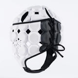 The Gilbert Octane Headguard is a white and black rugby headguard featuring hexagonal patterns, a lace-up design on the side, and EVA padding for superior sports protection.