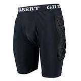 The Gilbert XP25 Protective Shorts are black padded rugby shorts featuring a "Gilbert" branded waistband and impact protection on one thigh, shown against a white background.