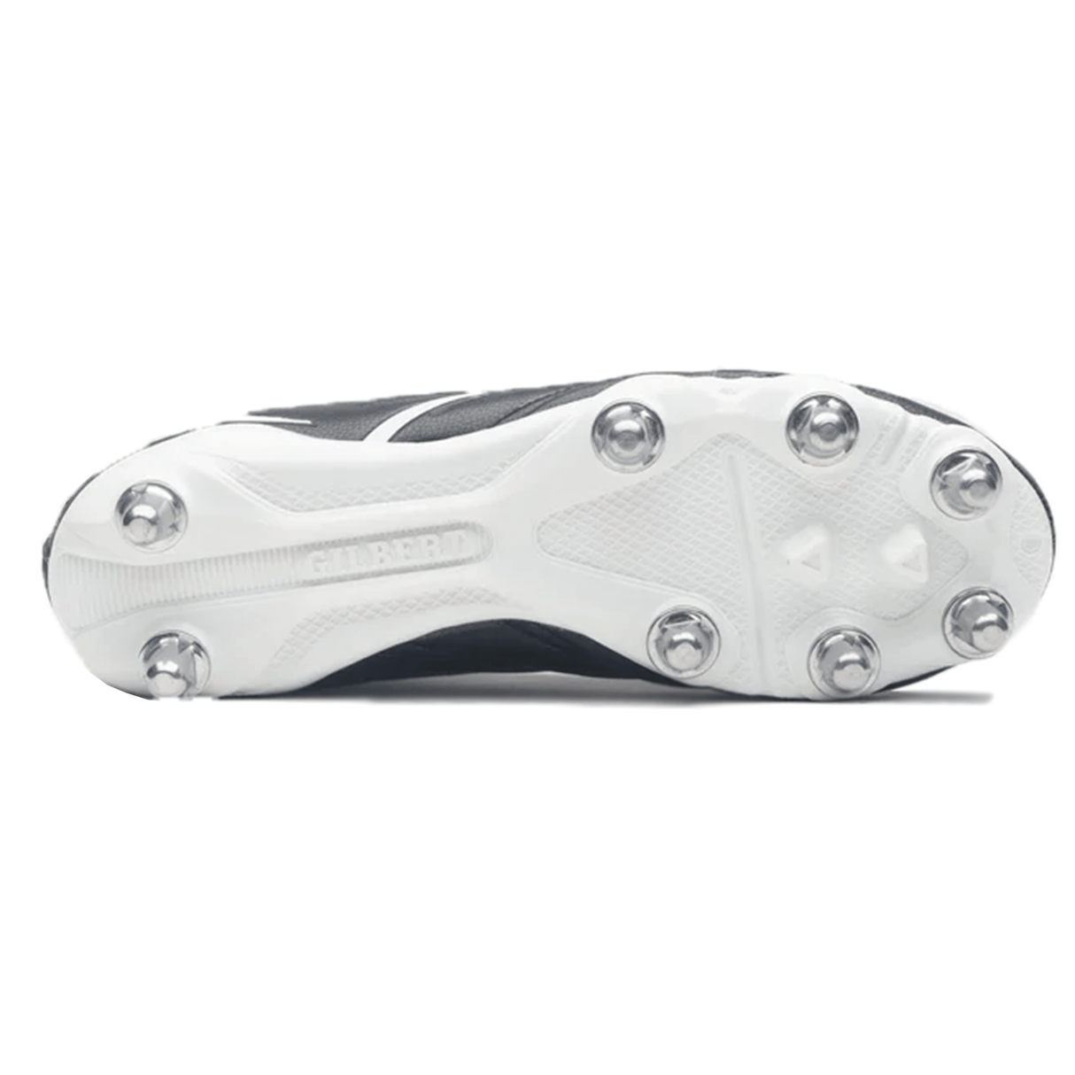 The image features the sole of the Gilbert Sidestep X20 8S Power SG - Black/White sports shoe from Gilbert, designed for power performance on soft ground. The metallic cleats are arranged in a hexagonal pattern.
