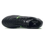 Top view of the Gilbert Sidestep X20 8S Power SG in black with a fizz green stripe, featuring the brand name "GILBERT" on the insole. Designed as rugby boots for soft ground, they offer excellent stability and traction.