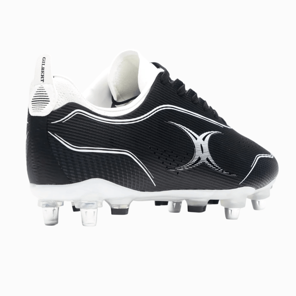 The Gilbert Cage Pace Pro 6S SG in Black/White features metal studs, a black design with white detailing, and the "GILBERT" logo on the heel tab. Specifically designed for use on grass surfaces, these rugby boots are engineered for optimal performance.