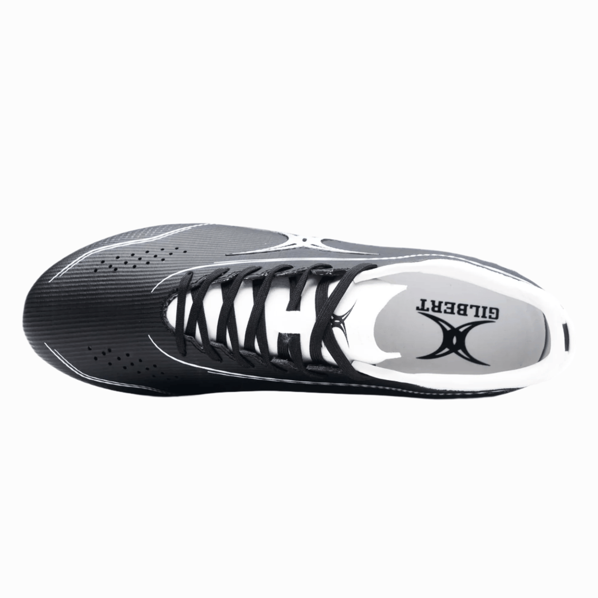 Top view of a black athletic shoe with white accents, featuring laces and a visible insole with the brand name "Gilbert" and logo, designed for superior rugby performance. The product is identified as the "Gilbert Cage Pace Pro 6S SG - Black/White".