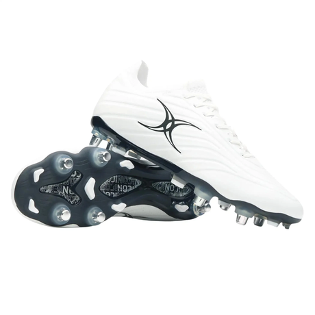 The Gilbert Icon X 6S SG - White rugby boots by Gilbert feature black accents, metallic soft ground studs, and a bold black abstract logo—ideal for forwards seeking performance and style.