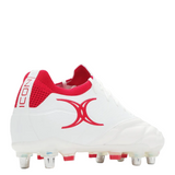 The Gilbert Icon Players 6S rugby boot by Gilbert features a white design with red accents, including a red logo and heel details, plus metal studs for elite soft ground performance. Displayed on a plain white background.