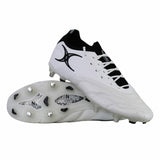 A pair of Gilbert Icon Players 2.0 6S rugby boots in white with black accents and metal studs, one boot displayed upright and the other on its side showcasing the sole.