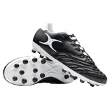 A pair of Sidestep Icon MSX rugby boots by Gilbert in black and white, featuring a synthetic leather upper and a prominent white Gilbert logo—one boot is displayed upright while the other shows the studded sole, designed specifically for firm ground rugby play.