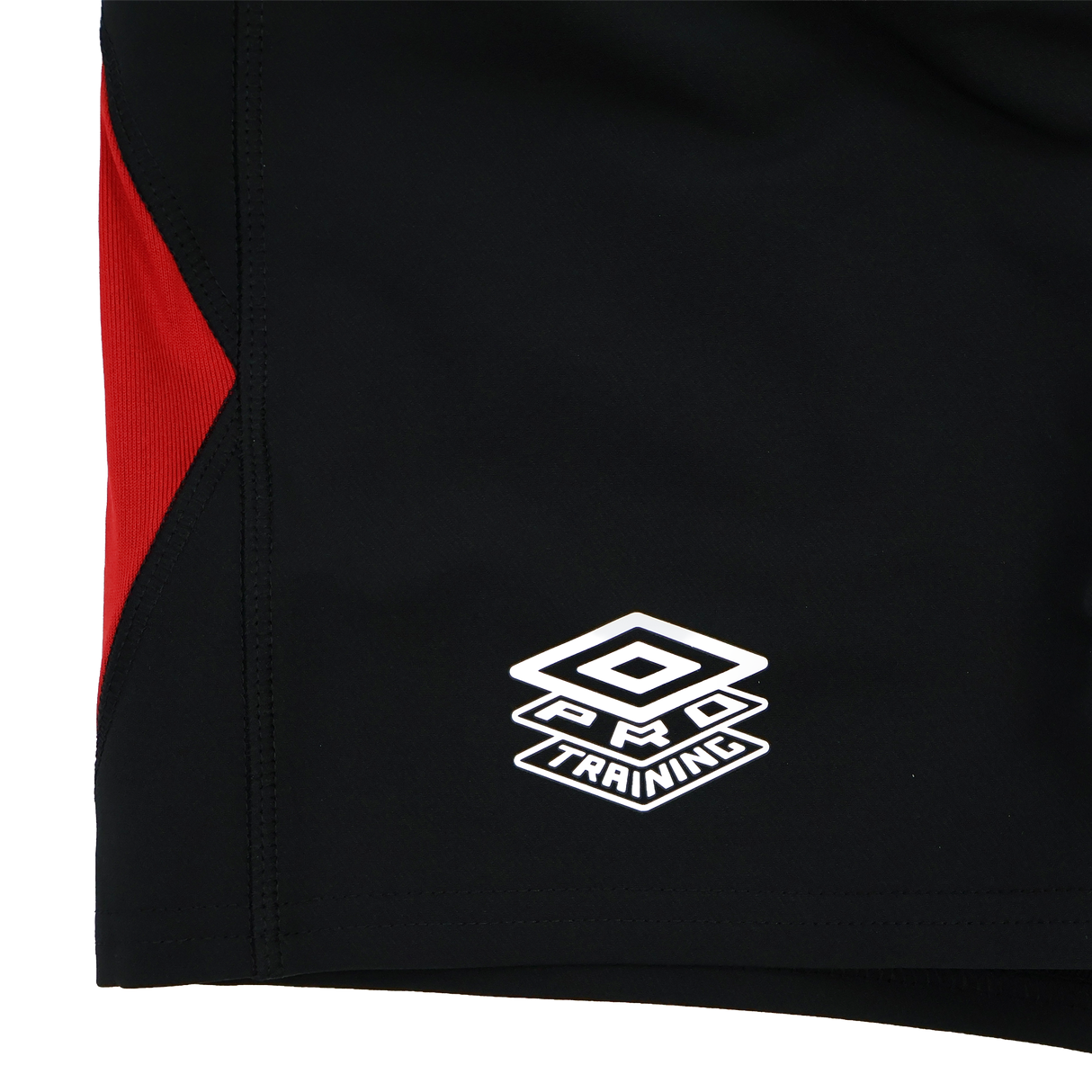 Close-up of the England Contact Training Short 24/25 by Umbro for Castore, in black with a red panel and white "PRO TRAINING" logo near the hem.