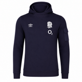 The Women's England Presentation OH Hoodie 24/25 by Umbro, from Castore, features a navy design with the Umbro logo, England rugby rose, and O2 sponsor on the chest plus a left sleeve pocket—a must-have for fans.