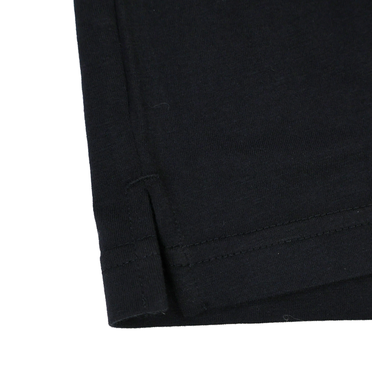 Close-up of the hem and side seam of the England Presentation Tee 24/25 by Umbro for Castore, featuring double stitching, a small side slit, and subtle England Rugby detailing.