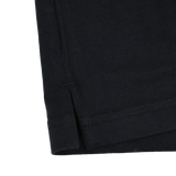 Close-up of the hem and side seam of the England Presentation Tee 24/25 by Umbro for Castore, featuring double stitching, a small side slit, and subtle England Rugby detailing.