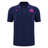 The Scotland 25/26 Player Travel Cotton Polo by Macron features navy blue with pink accents, Scottish Rugby crest, and sponsor logo on the chest. This classic polo is crafted from quality cotton by Macron.