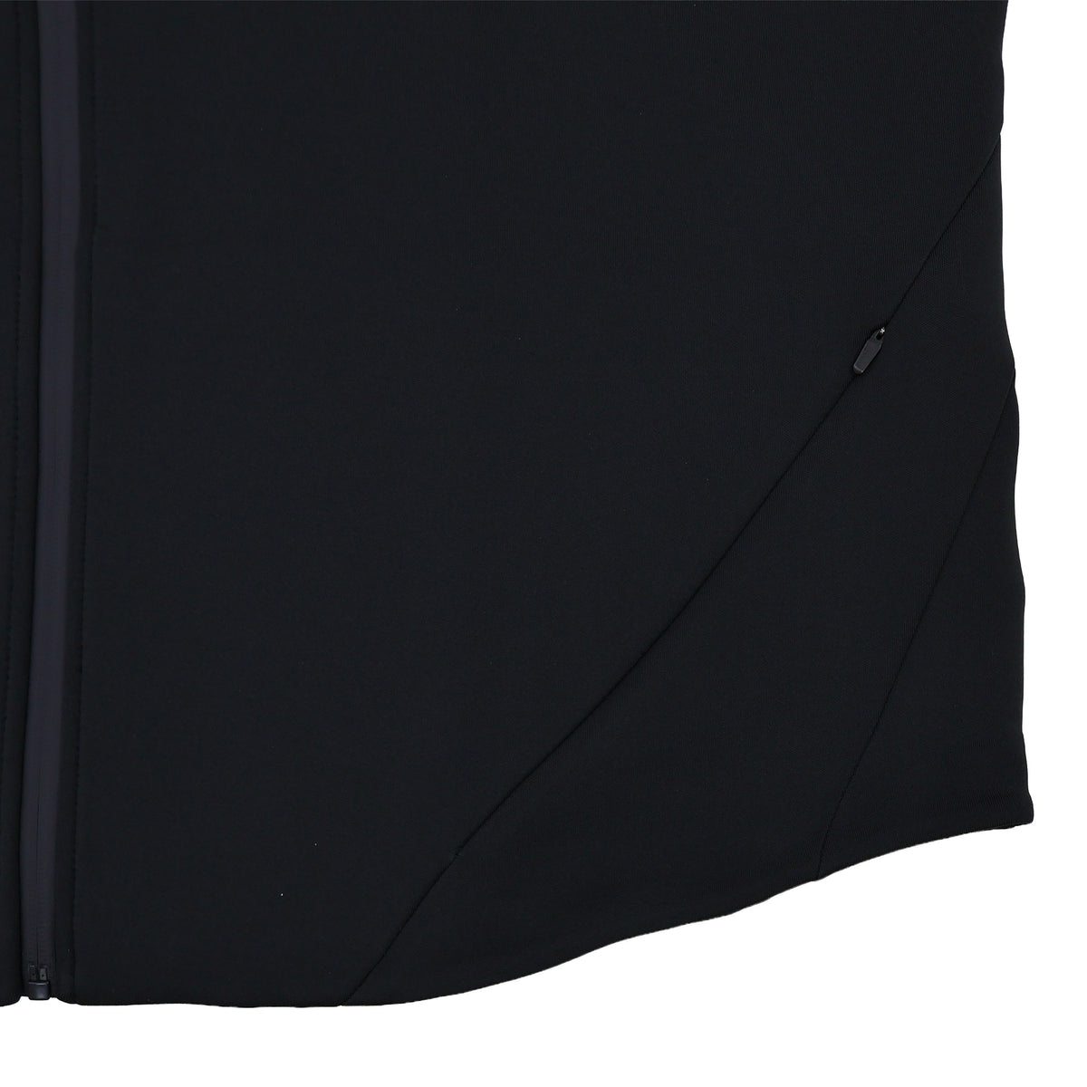 Close-up of the lower side section of the black Ireland 25/26 Travel Hoodie by Canterbury, featuring a zipper on the left and a small zippered pocket on the right side.