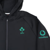 Show your support in style with the Ireland 25/26 Travel Hoodie by Canterbury. This black hooded jacket features the iconic IRFU and Vodafone logos printed in green on the chest and sleeve, combining comfort and fan pride—perfect for any Ireland Rugby supporter.