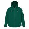 The Ireland 26 Full-Zip Tech Training Hoodie by Canterbury is a green hoodie featuring the IRFU and Canterbury logos on the front, with a Vodafone logo on the left sleeve, displayed against a white background. This Canterbury hoodie is perfect for showing your support for Ireland Rugby while staying comfortable and stylish.