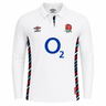 The Women's England 24/25 Home Classic LS Jersey by Umbro features a classic white design with blue and red striped trim, Umbro logo, red rose crest, and O2 sponsor—a timeless choice for England rugby fans.