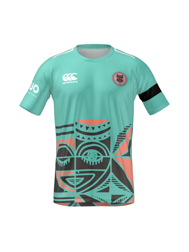 The Teamatical Armed Forces Okinawa Canterbury Men's Maka Reversible Jersey Regular features teal and coral Polynesian-inspired geometric patterns, a black armband, sponsor logos, and a circular badge on the left chest.