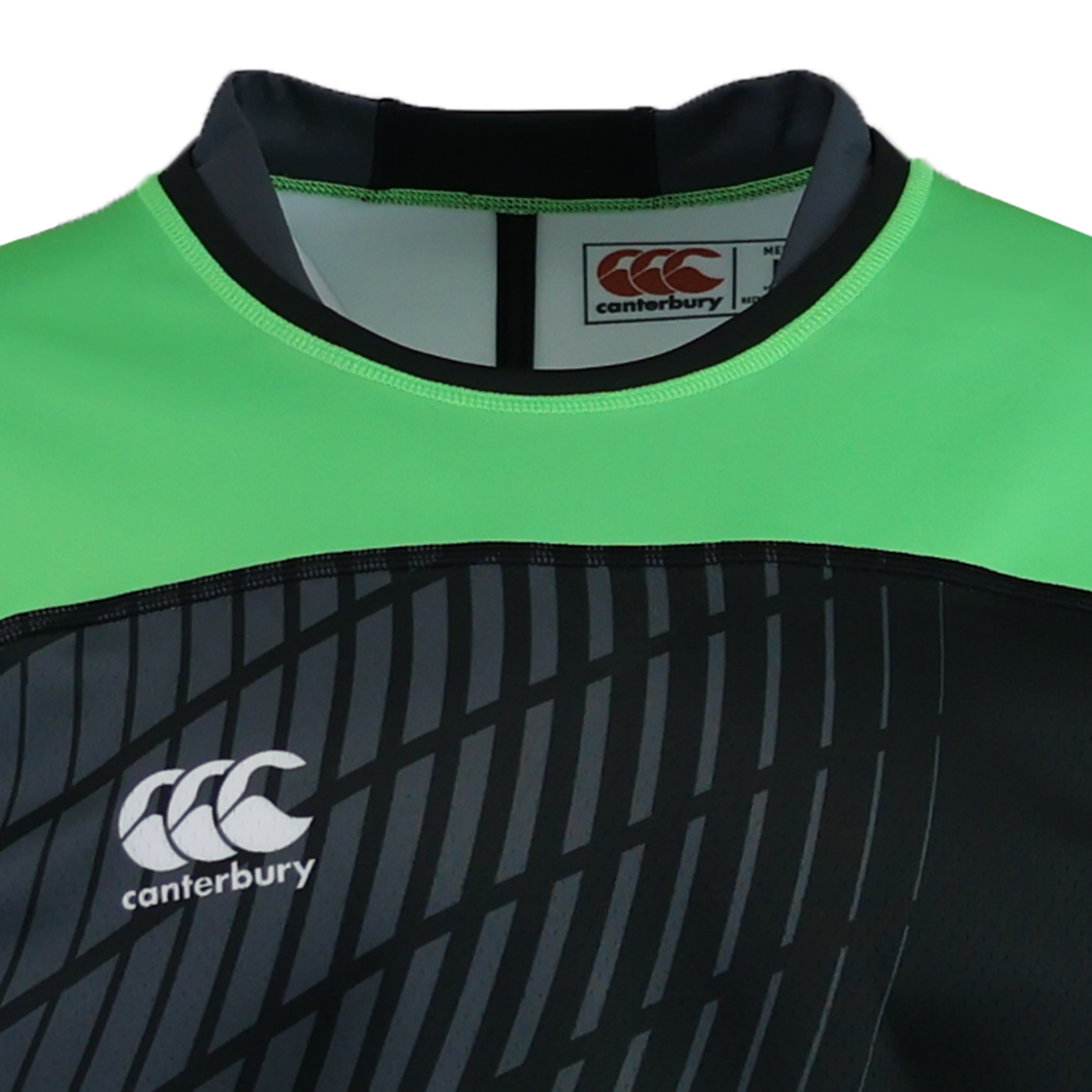 Close-up of the Teamatical CANTERBURY RAIONA COLLAR TEST JERSEY for men, showcasing green and black panels, a geometric front pattern, Canterbury logo, and breathable mesh for ultimate comfort.