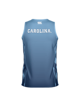 The Teamatical UNC Rugby Canterbury Performance Singlet is a blue athletic jersey featuring "CAROLINA" in white capital letters on the back and a small logo near the neckline.