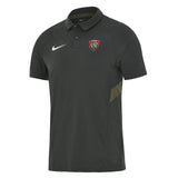 Black short-sleeved RC Toulon Training Polo by Nike with a button placket, a white swoosh logo on the right chest, and a team crest on the left chest.