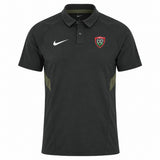 Black RC Toulon Training Polo by Nike with a dark green side panel, a white Nike swoosh on the right chest, and the team crest on the left.
