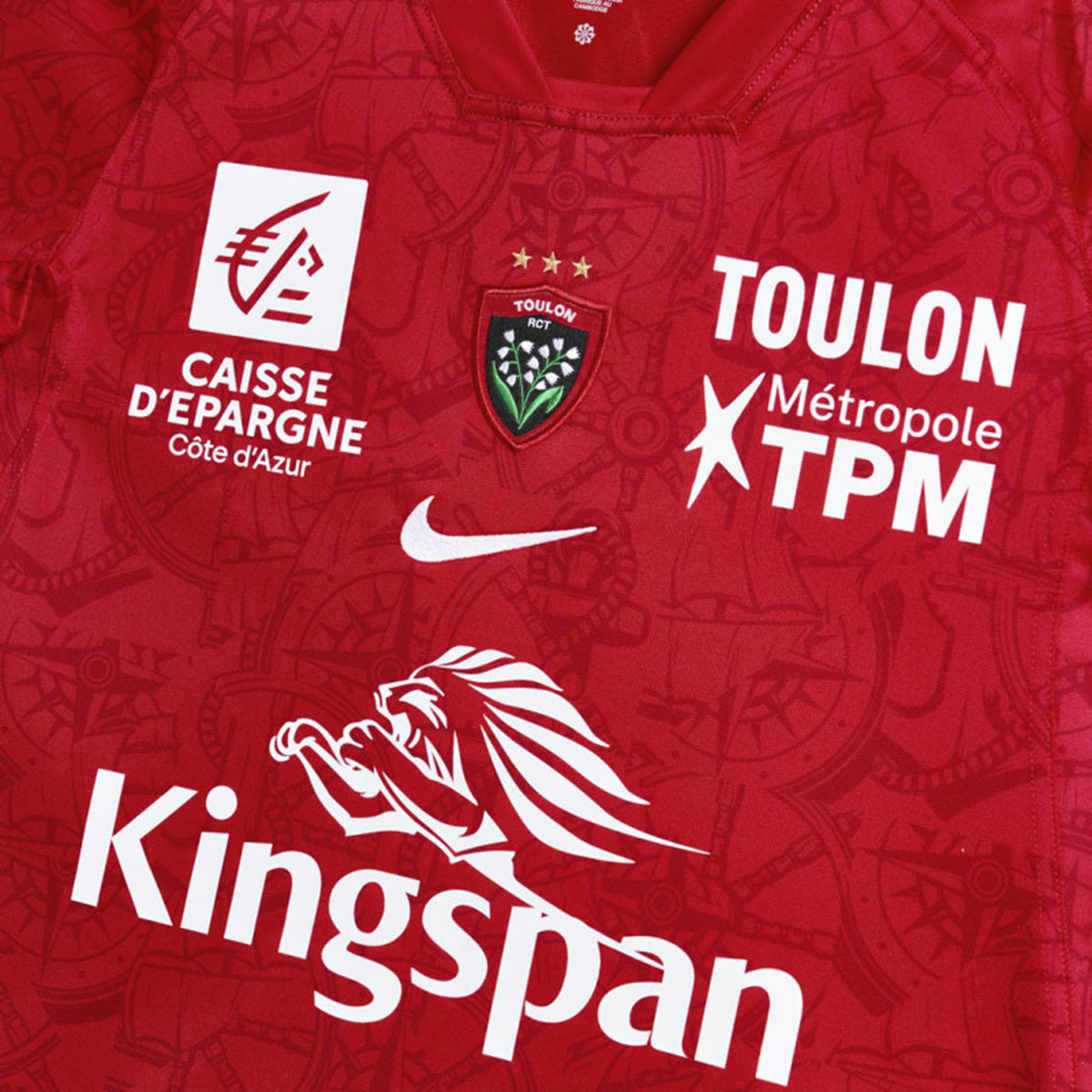 Red RC Toulon 26/27 Stadium Home Jersey by Nike featuring sponsor logos, the club crest, and a faint patterned background.